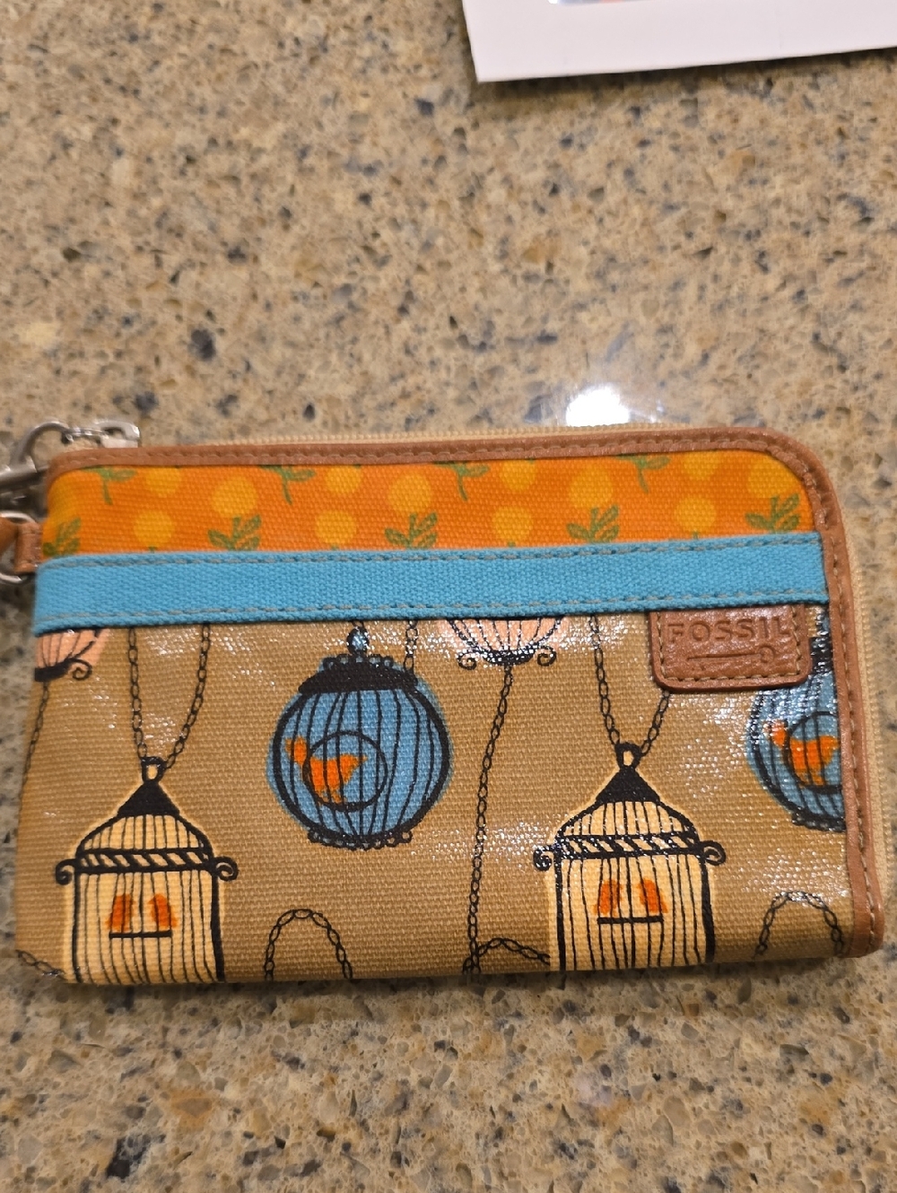 Fossil Tan Wallet with Blue Trim and Orange Accents